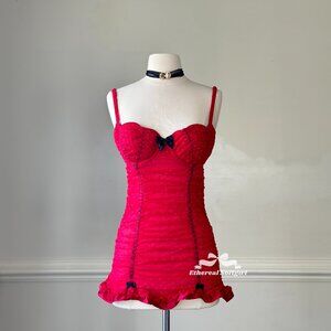 Victoria’s Secret bodycon slip dress featuring ruched polka hearts material